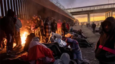 Miles de inmigrantes esperan poder cruzar la frontera de EE.UU. en medio de un frío extremo. 
