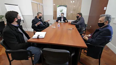 Adán Bahl con Rodríguez Signes y funcionarios de Transporte