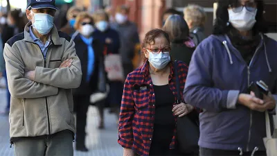 coronavirus gente con barbijo